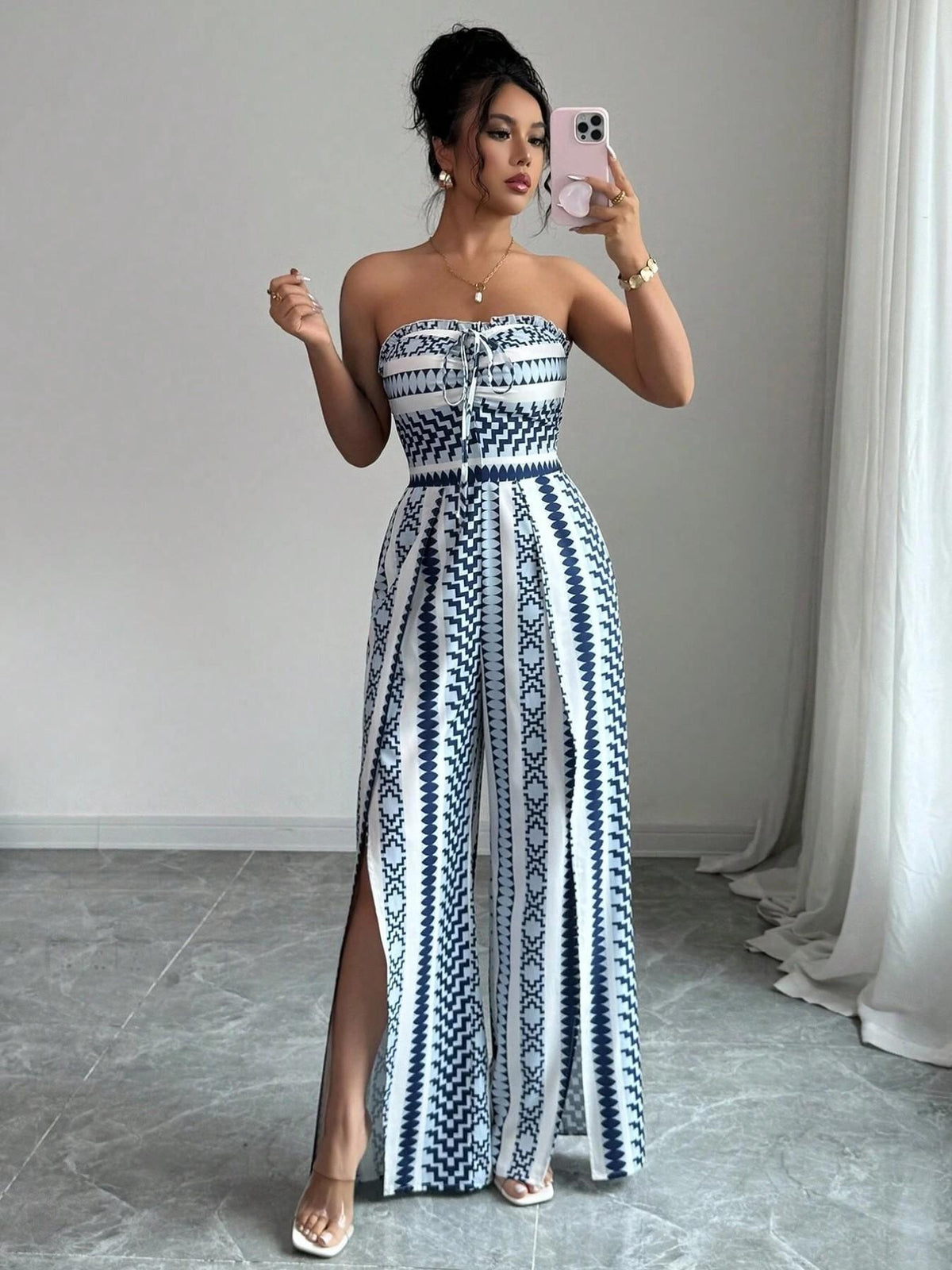 Elisa Jumpsuit with round neckline and side slits