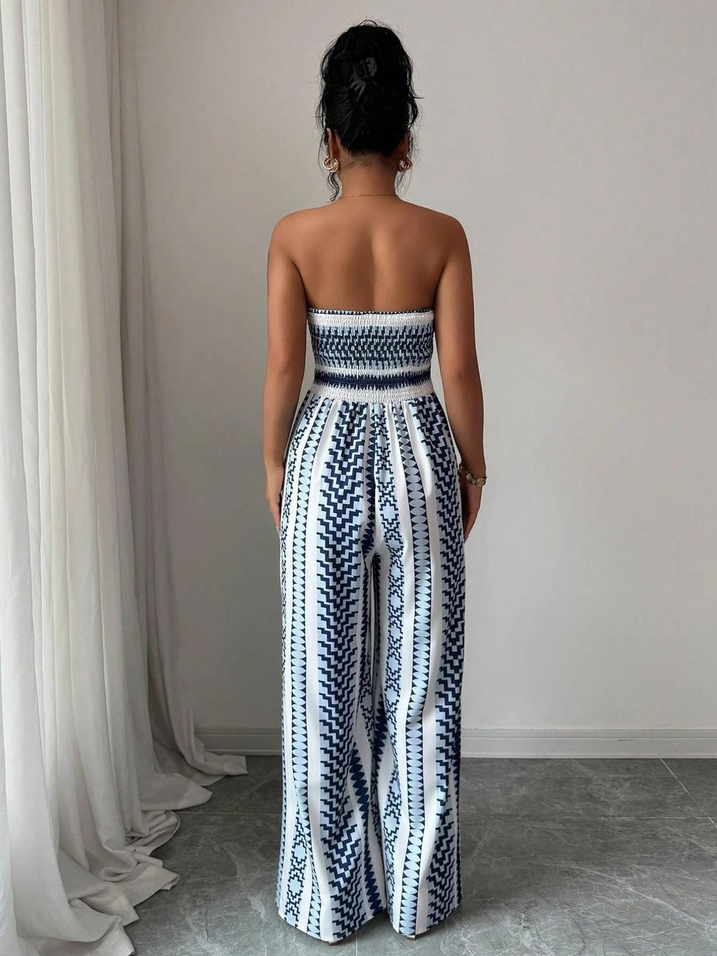 Elisa Jumpsuit with round neckline and side slits