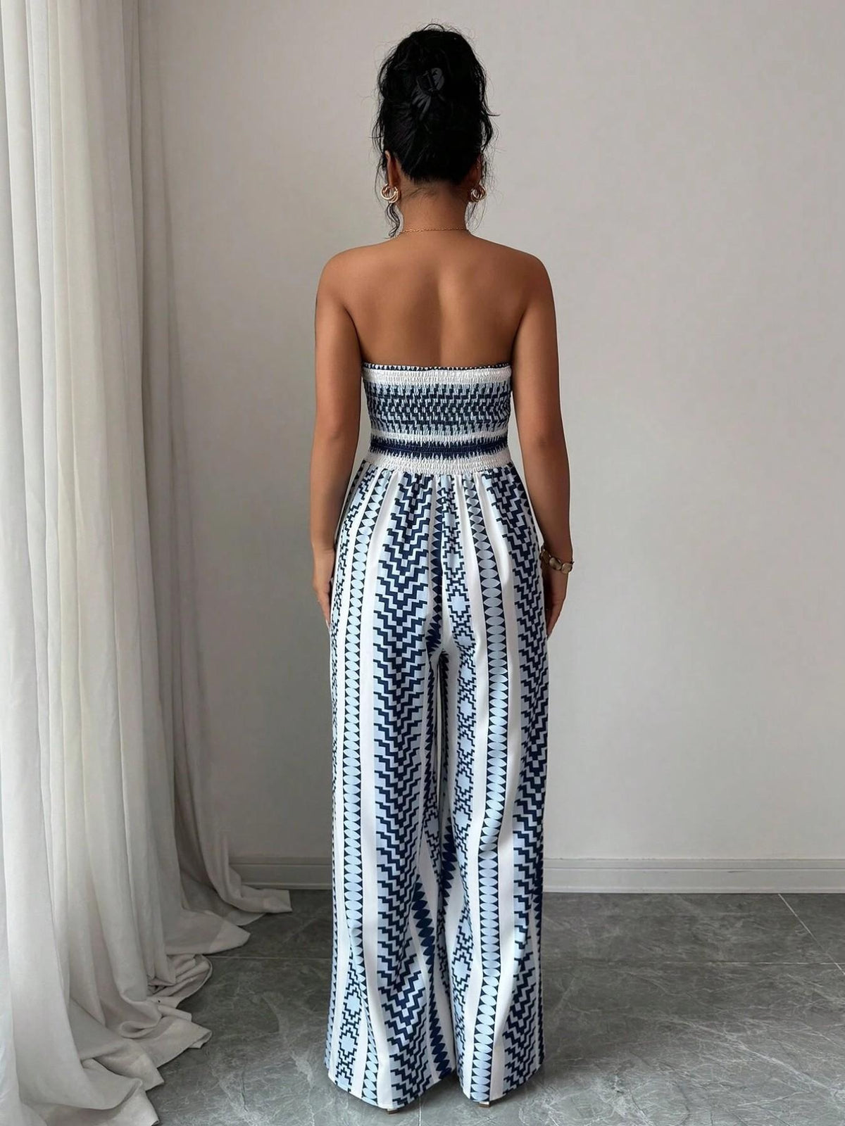 Elisa Jumpsuit with round neckline and side slits