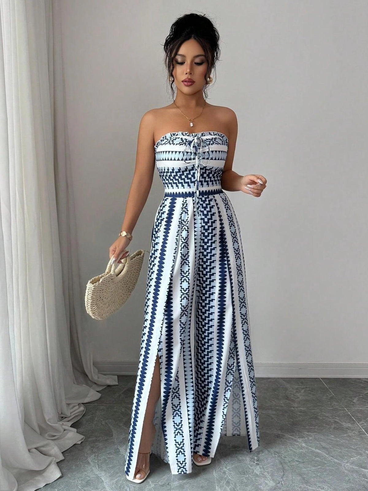 Elisa Jumpsuit with round neckline and side slits