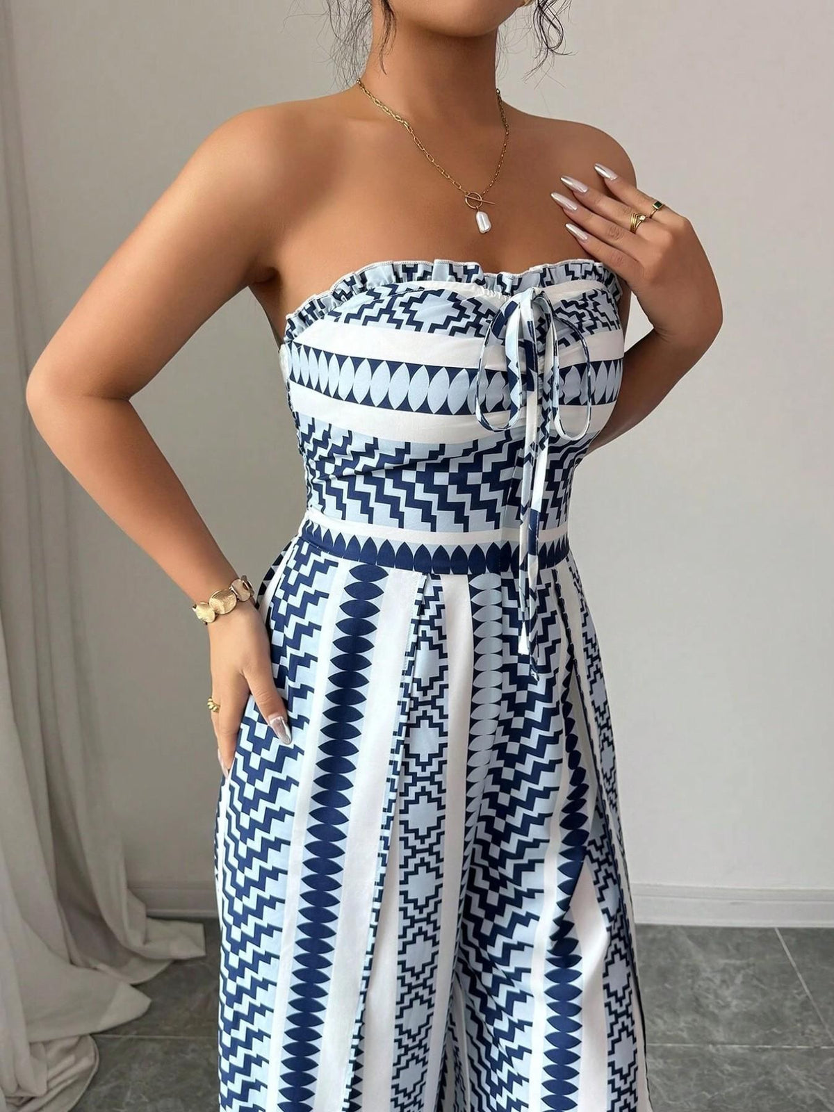 Elisa Jumpsuit with round neckline and side slits